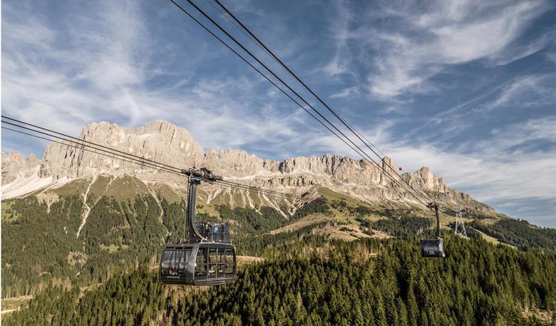 Convertible-style cable car from Tiers to the Rosengarten massif